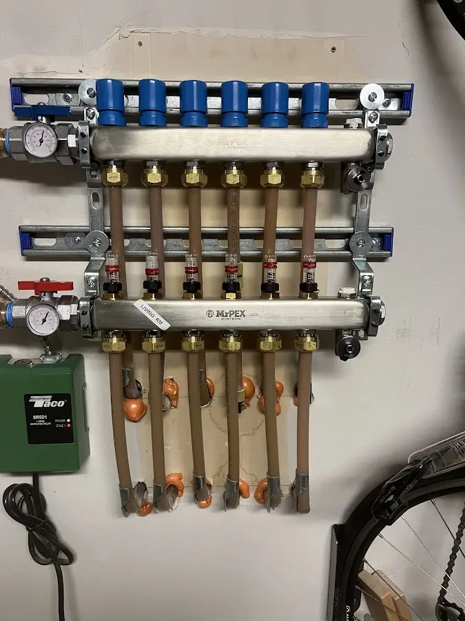 Plumber performing Water Heater Repair at a residential property in Allenstown